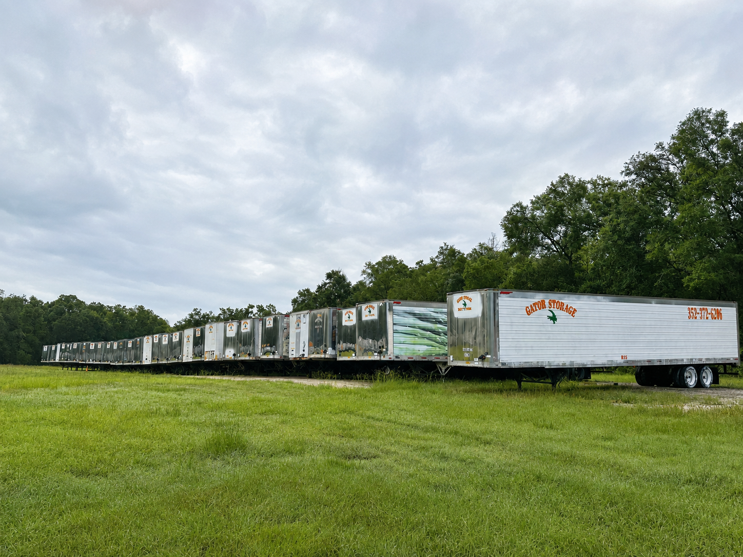 Gator Storage branded storage trailers lined up and ready to rent at the Bell, FL yard
